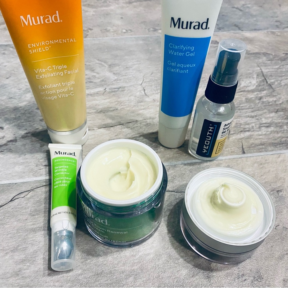 Murad Skincare Collection with Green, White, and Orange Packaging